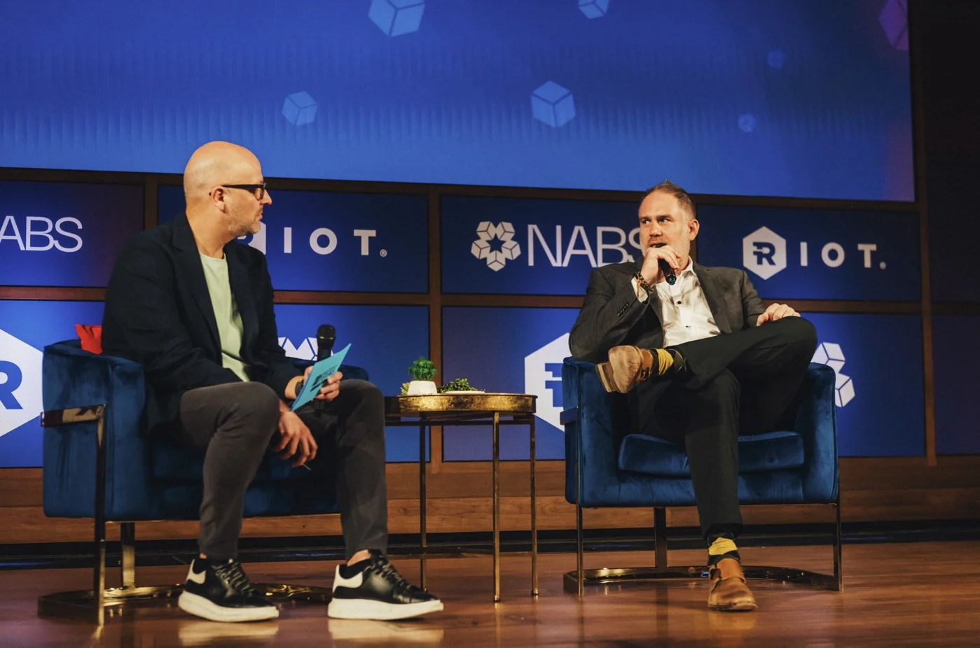 John Wingate in a fireside at the Texas Blockchain Summit with Credit Union of Texas